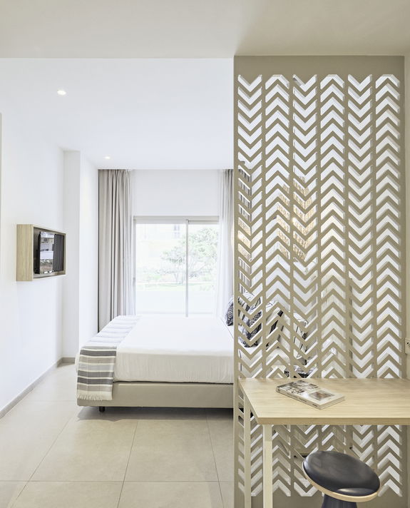 slide Suite con una camera da letto e <br>vista sul giardino