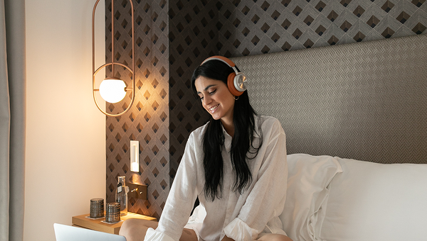 Guest enjoying music in room