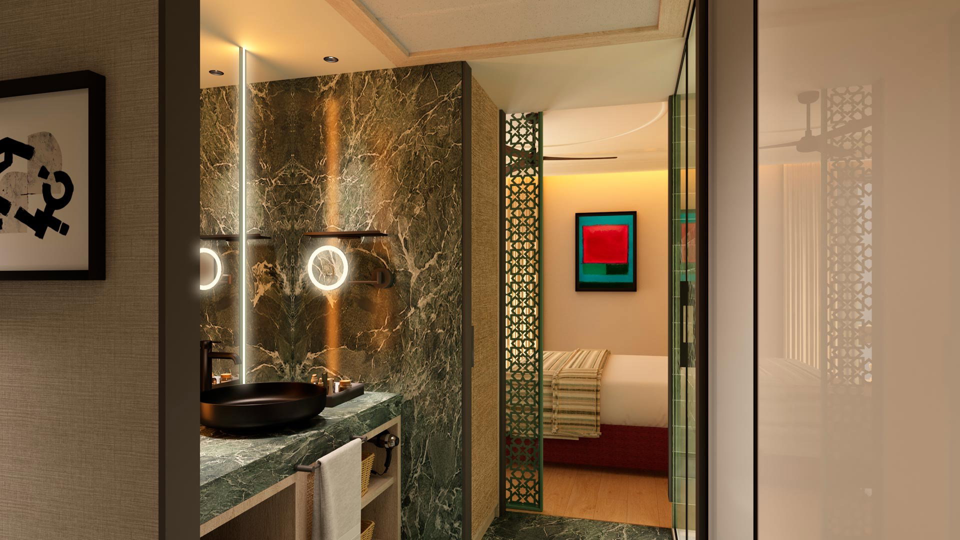 Baño con lavabo negro sobre encimera de mármol verde, espejos redondos iluminados y paso al dormitorio al fondo