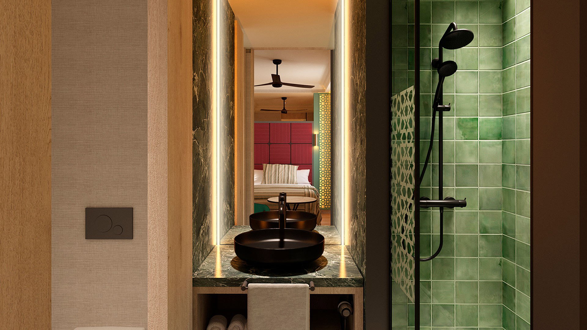 Baño con ducha de azulejo verde, lavabo negro sobre mármol verde y espejo retroiluminado