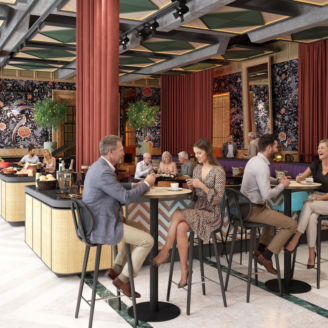 Clientes desayunando junto a los mostradores del buffet, con mesas altas y naranjos
