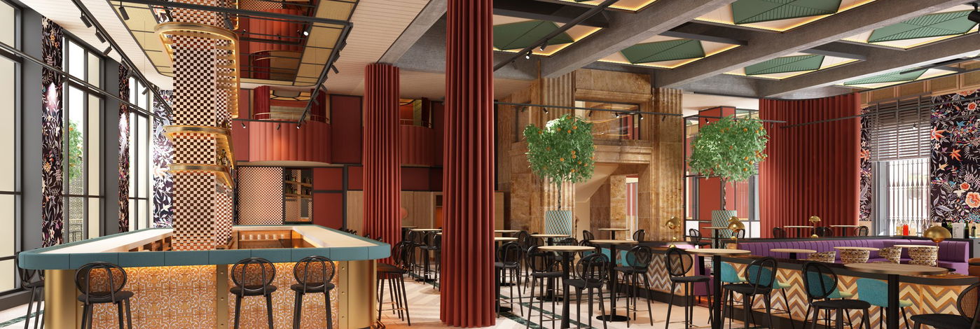 Barra central de tapa verde azulado en la sala del restaurante, con naranjos y cortinaje granate