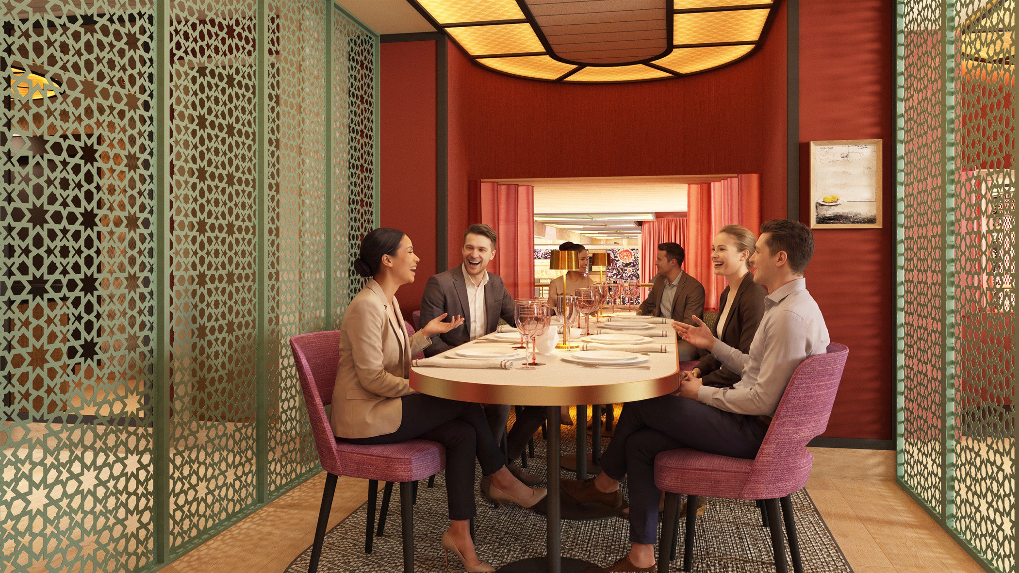 Sala privada con mesa redonda preparada para un grupo, sillas en tonos rosa y granate