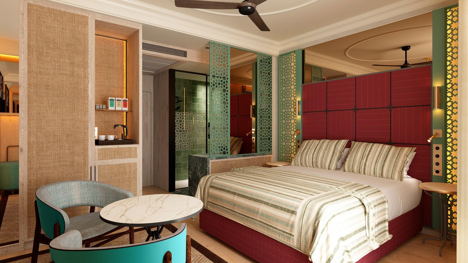 Habitación con cama de matrimonio de cabecero granate, butacas turquesa y rincón con hervidor