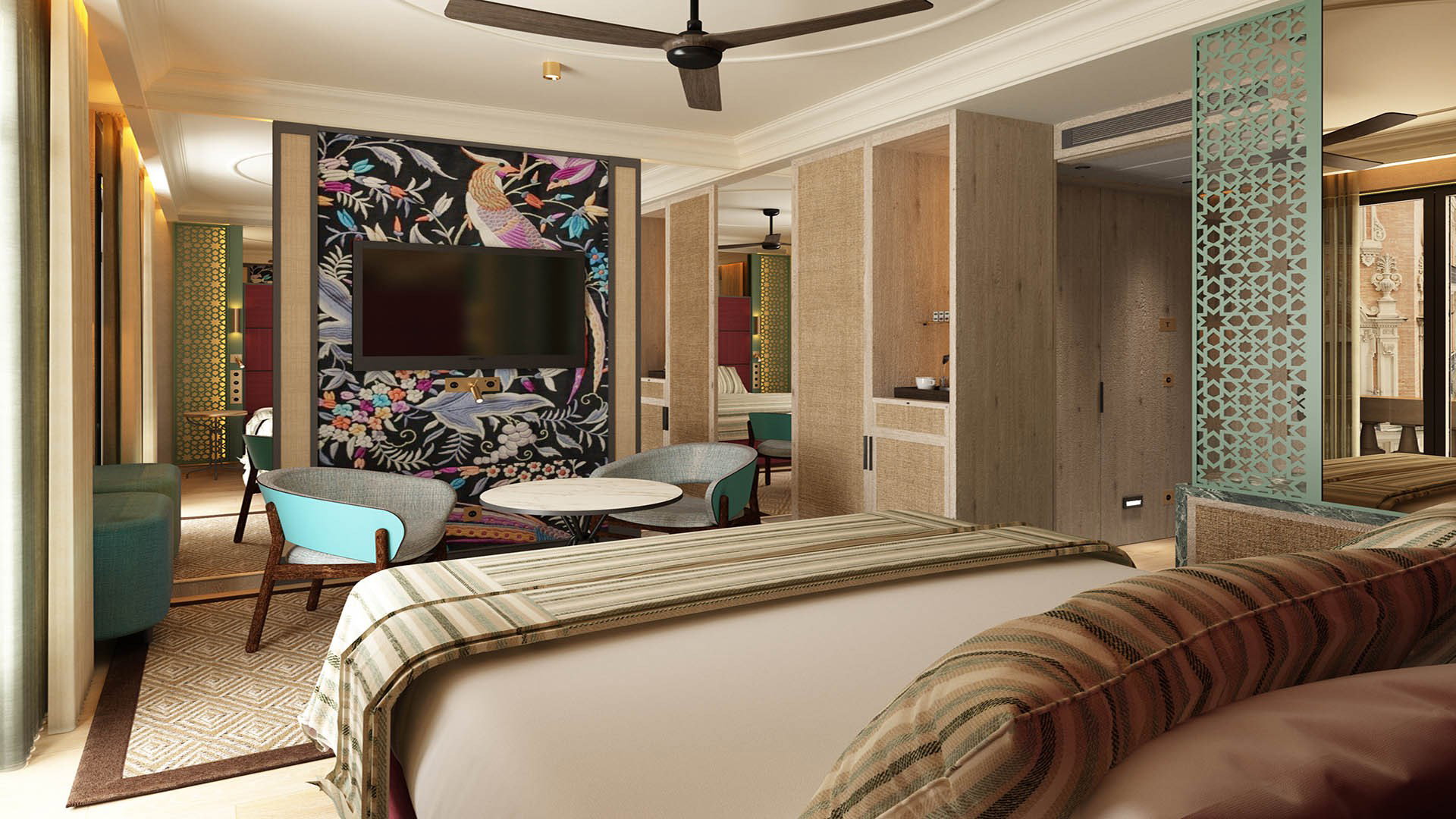 Dormitorio con cama vestida en rayas y, al fondo, zona de estar con butacas turquesa y panel de papel pintado floral con un ave